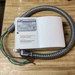 Chronomite M-20L/277 Instant-flow Micro Tankless Electric Hot Water Heater Used. Price: $60.00.