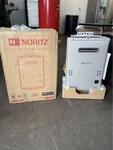 New In Box Noritz Tankless Water Heater NR501-OD-NG Silver Edition Open. Price: $549.00.