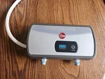Rheem RETEX-06 Kw 1.0 Gpm Electric Tankless Water Heater Gray 475 Open. Price: $89.95.