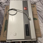 Rheem Indoor Natural Gas Tankless Water Heater 9.5 Gpm Smart Wifi ECO200DVELN-3 Open. Price: $550.00.