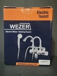 Wezer Electric Heater Faucet Instant Hot Water- HY25-07XY (new Open Box). Price: $35.00.